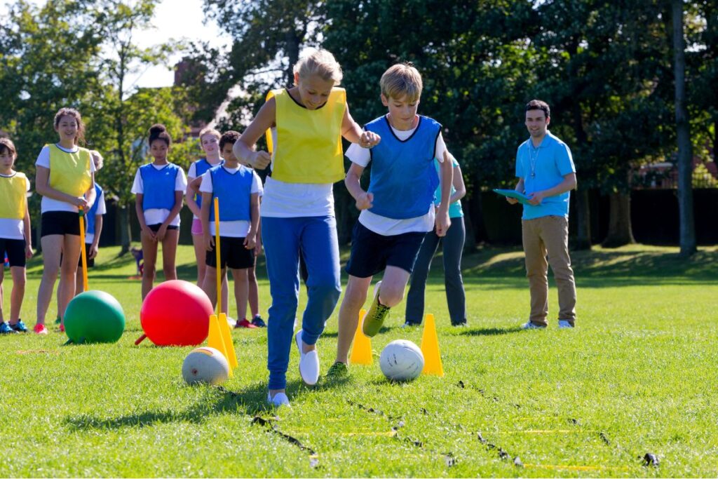 teens competing in an obstacle course