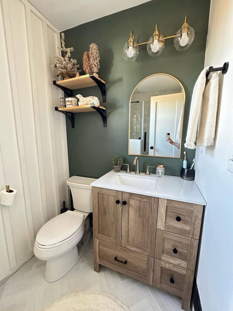 bathroom remodel with one wall painted in alabaster by sherwin williams