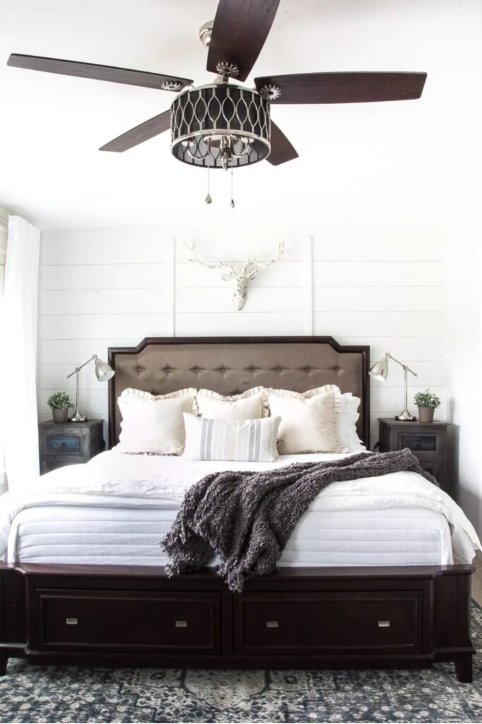 one bedroom wall painted in alabaster
