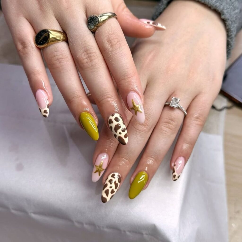 Cow Print and Golden Yellow Nails